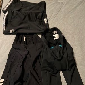 Lot of Pearl Izumi Womens Cycling Shorts Size M and a size large.
